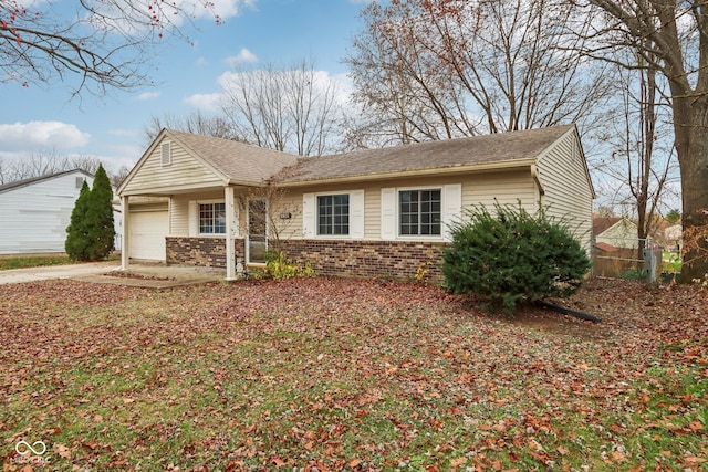 single story home with a garage