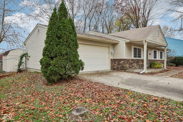 view of side of home featuring a garage