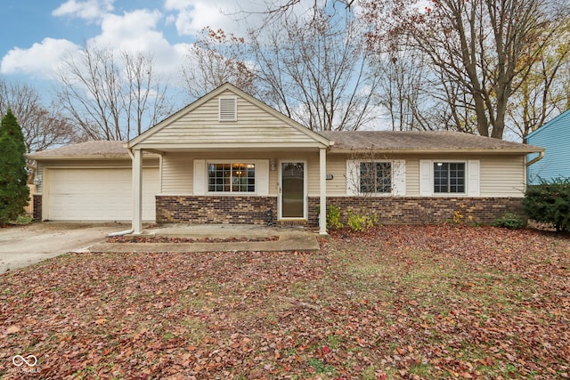 ranch-style home featuring a garage