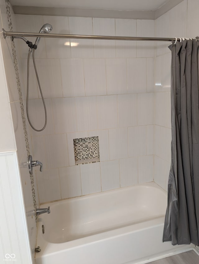 bathroom featuring shower / bath combination with curtain