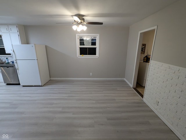 kitchen featuring stainless steel dishwasher, white fridge, white cabinets, and light wood-type flooring