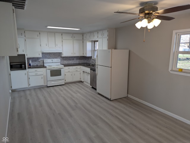 kitchen with ceiling fan, backsplash, light hardwood / wood-style floors, white cabinets, and appliances with stainless steel finishes