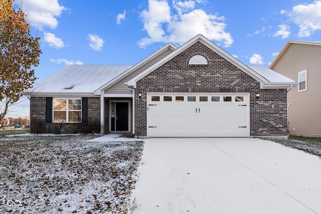 view of front of property featuring a garage