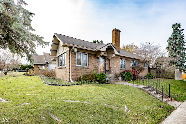 view of front of home with a front lawn