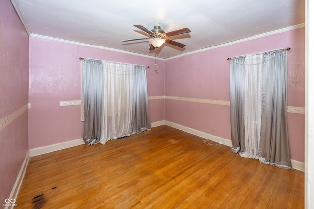 1330 N Bosart Ave, Indianapolis, IN 46201 - unfurnished room featuring a ceiling fan, wood finished floors, ornamental molding, and baseboards