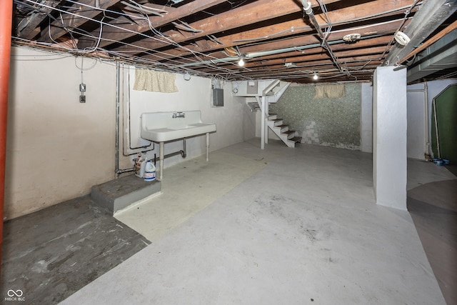 1330 N Bosart Ave, Indianapolis, IN 46201 - unfinished basement with stairway and a sink