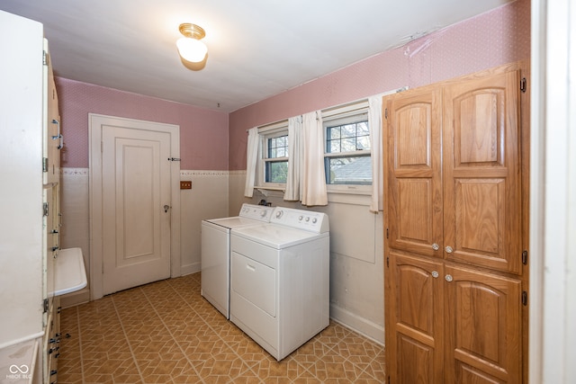 laundry area with washer and dryer