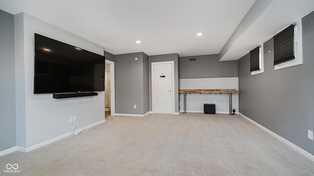 unfurnished living room with carpet floors