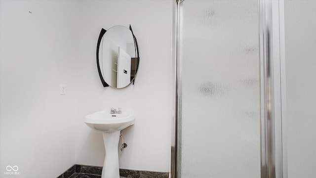 bathroom with an enclosed shower