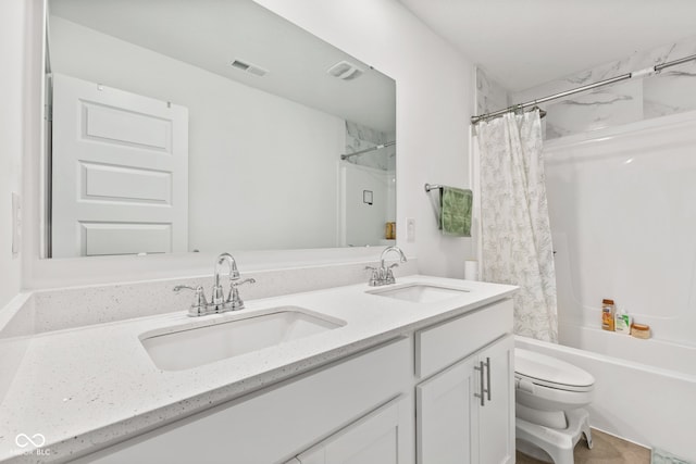 full bathroom featuring vanity, toilet, and shower / bath combo with shower curtain