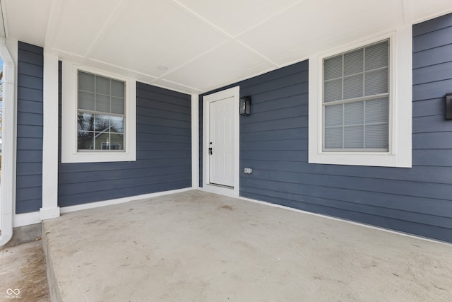 doorway to property with a porch