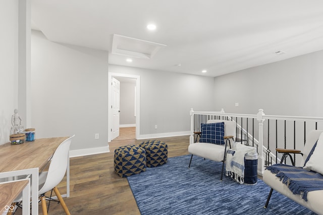 sitting room with dark hardwood / wood-style flooring