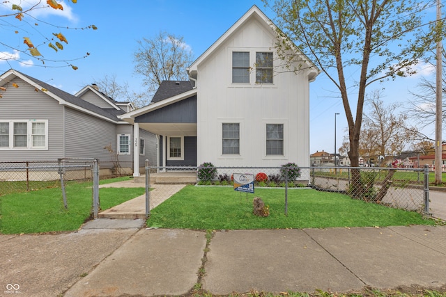 view of front of property with a front lawn