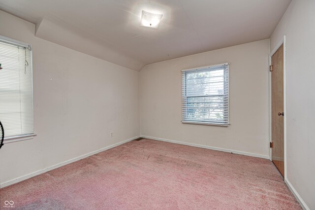 80 S Mickley Ave, Indianapolis, IN 46241 - spare room featuring carpet floors and vaulted ceiling
