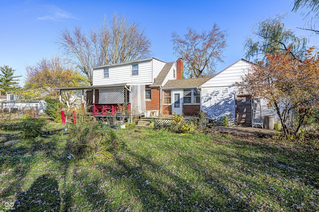 80 S Mickley Ave, Indianapolis, IN 46241 - view of front facade with a chimney, brick siding, and an attached garage