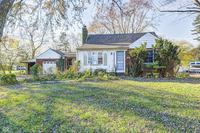80 S Mickley Ave, Indianapolis, IN 46241 - view of front of home featuring a chimney, a front yard, and an attached garage
