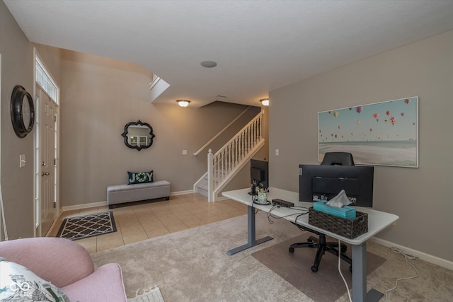 office space with light colored carpet