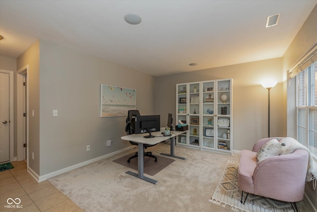 home office featuring light tile patterned floors