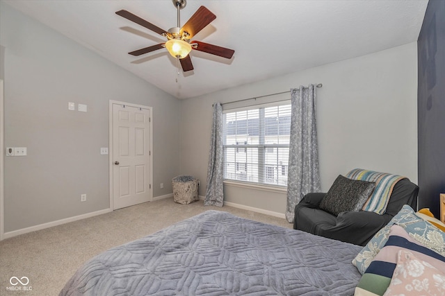 carpeted bedroom featuring ceiling fan and vaulted ceiling