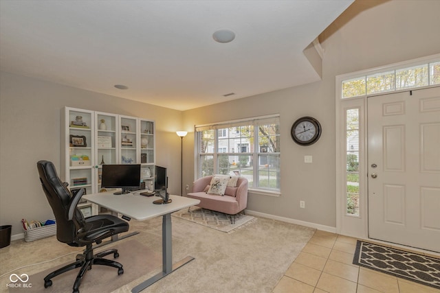 home office with light tile patterned floors