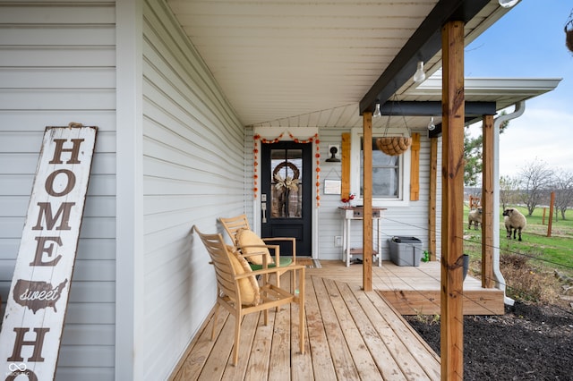 entrance to property with covered porch