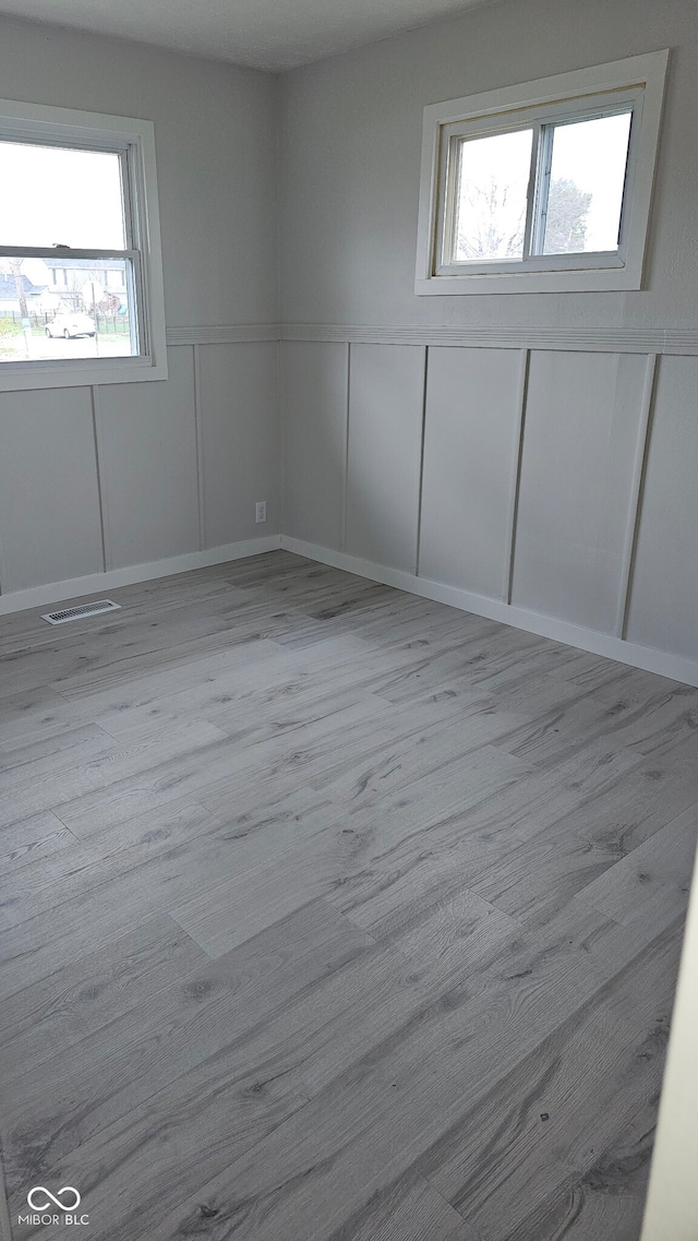 unfurnished bedroom featuring light hardwood / wood-style floors