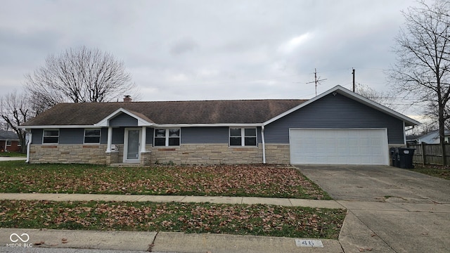 ranch-style house featuring a garage