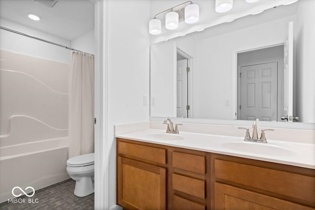 full bathroom with vanity, shower / bathtub combination with curtain, and toilet