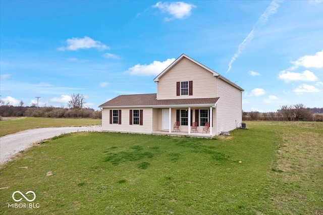 view of front of home with a front lawn and covered porch