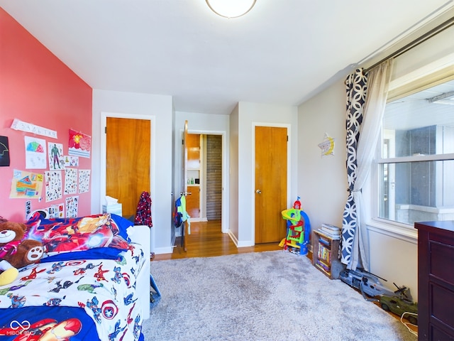 bedroom featuring wood-type flooring