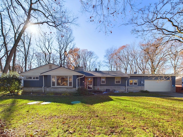 single story home with a garage and a front lawn