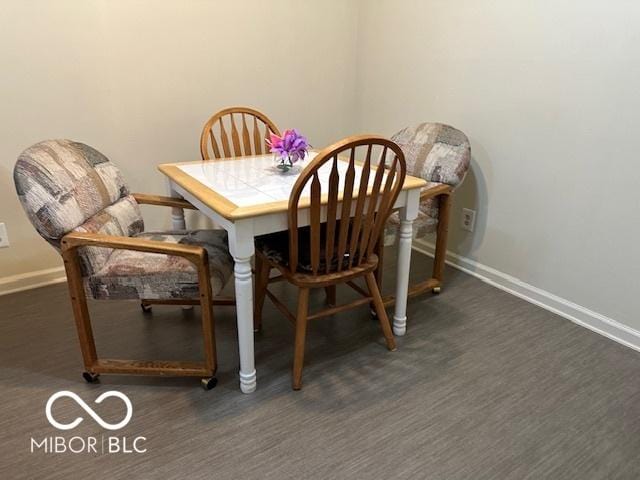 dining room featuring dark hardwood / wood-style floors