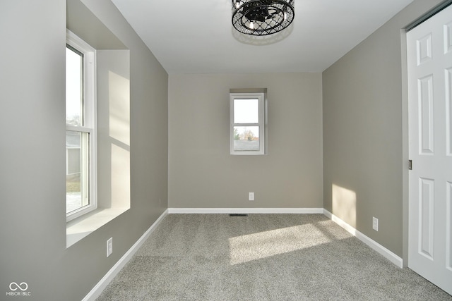 view of carpeted spare room