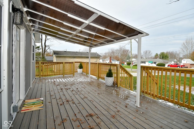 wooden deck with a yard