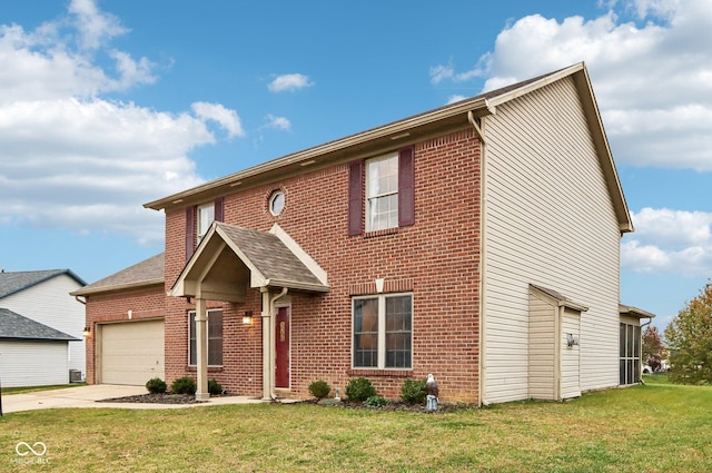 view of front of house with a garage and a front yard