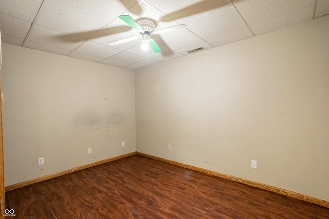 1510 S Greensboro Pike, New Castle, IN 47362 - spare room with a drop ceiling, ceiling fan, and wood-type flooring