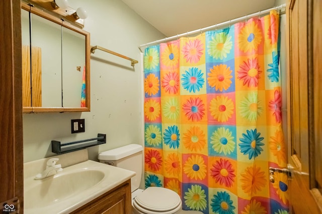 1510 S Greensboro Pike, New Castle, IN 47362 - bathroom featuring a shower with shower curtain, vanity, and toilet