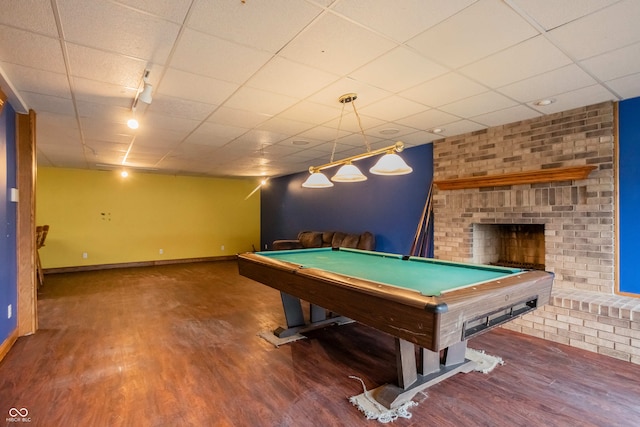 1510 S Greensboro Pike, New Castle, IN 47362 - recreation room with a brick fireplace, hardwood / wood-style floors, a drop ceiling, and billiards