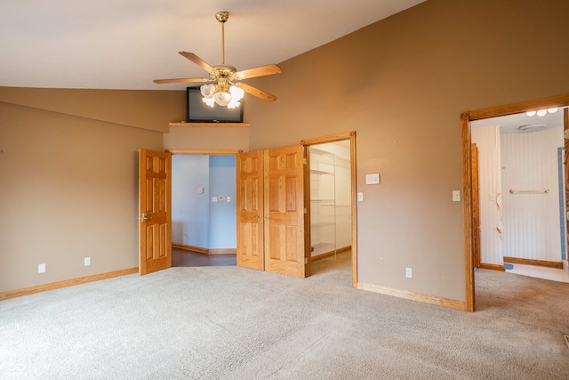 1510 S Greensboro Pike, New Castle, IN 47362 - unfurnished bedroom with light carpet, a closet, a spacious closet, and ceiling fan