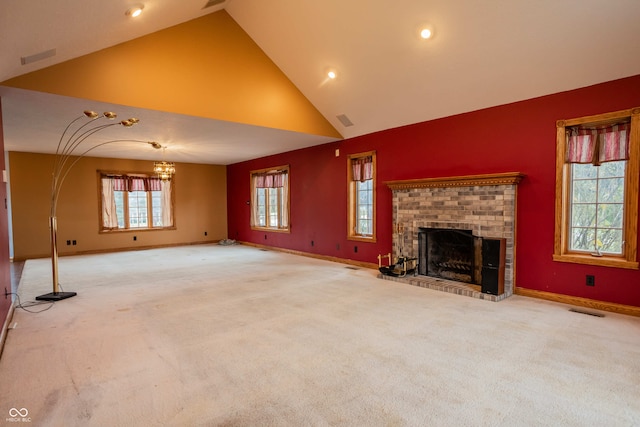 1510 S Greensboro Pike, New Castle, IN 47362 - unfurnished living room with plenty of natural light, carpet, and a brick fireplace