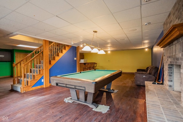 1510 S Greensboro Pike, New Castle, IN 47362 - game room with a drop ceiling, a fireplace, dark wood-type flooring, and pool table