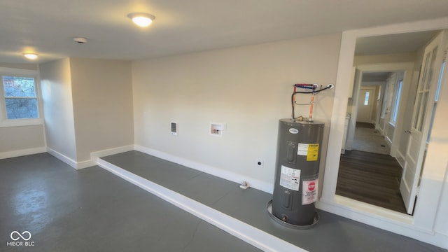 utility room featuring electric water heater