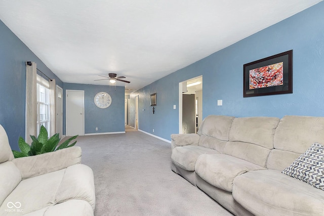 living room featuring ceiling fan and carpet flooring