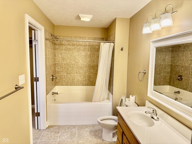 full bathroom featuring tile patterned floors, a textured ceiling, toilet, shower / bath combo with shower curtain, and vanity