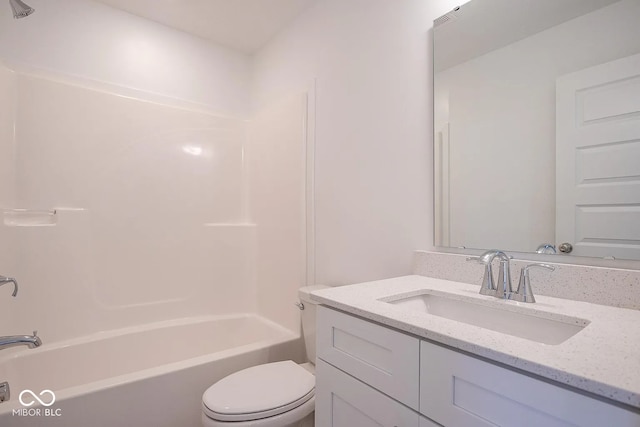 full bathroom with shower / bathing tub combination, vanity, and toilet