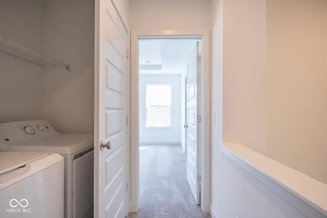 washroom with light carpet and washer and clothes dryer