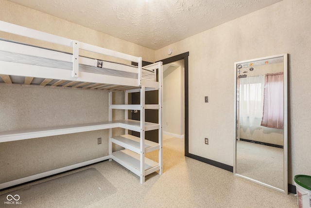 unfurnished bedroom featuring a textured ceiling