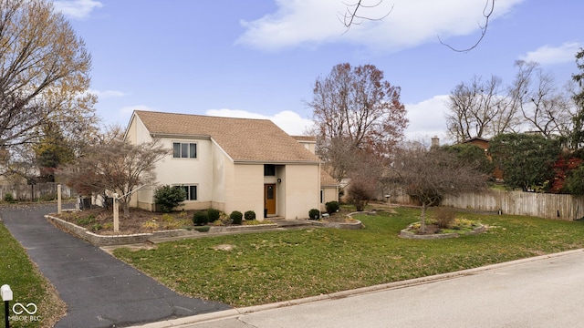 view of front of house with a front lawn