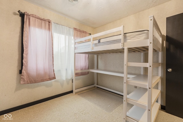 unfurnished bedroom featuring a textured ceiling