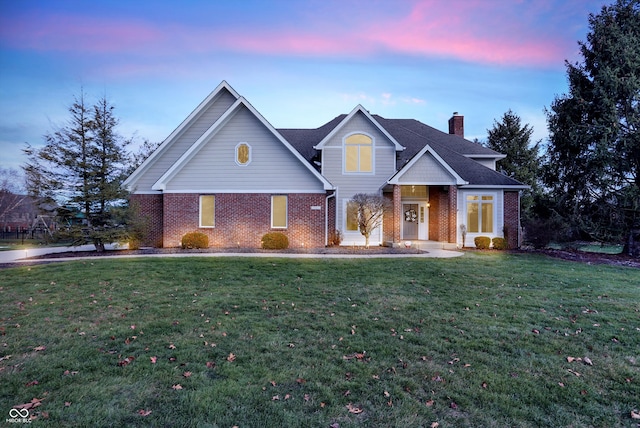 view of front of home with a yard